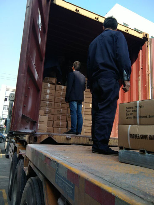 loading shoe repair items to container